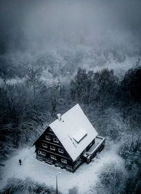 High angle view of house amidst forest