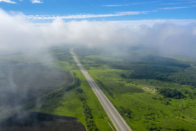 High angle view of road amidst landscape against sky