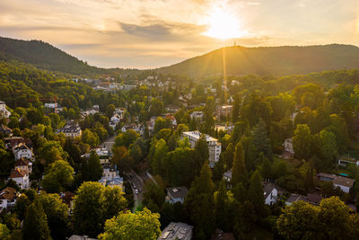 Scenic view of townscape against sky during sunset