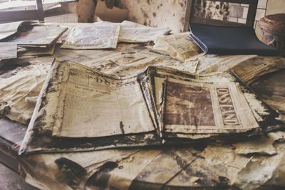 High angle view of old books on table