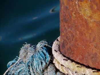 Close-up of fishing net at harbor