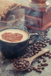 Close-up of coffee cup on table