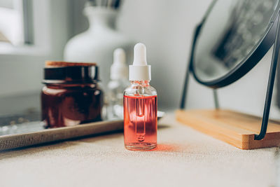 Close-up of beauty products on table