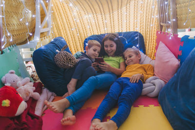 High angle view of mother and daughter at home