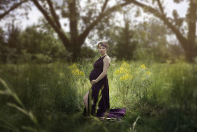 Woman standing on field