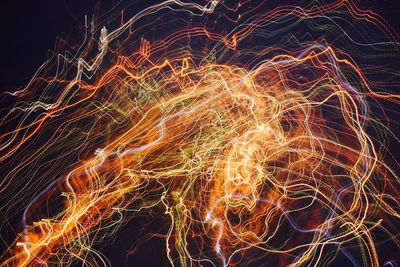 Close-up of firework display at night