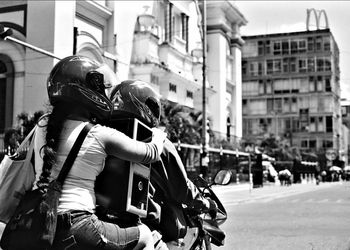 Woman standing in city