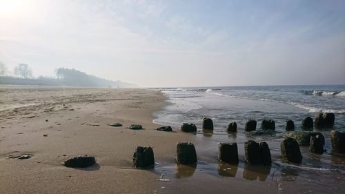 Scenic view of beach against sky