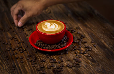 Close-up of coffee cup on table