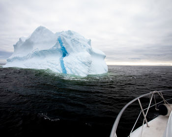 An iceberg on the gulf of st lawrence, quebec viewed from a boat. 