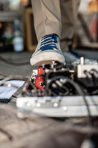 Close-up of man playing guitar