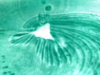 Full frame shot of bubbles in sea