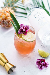 Close-up of purple served on wooden table