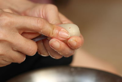 Close-up of woman holding ice cream