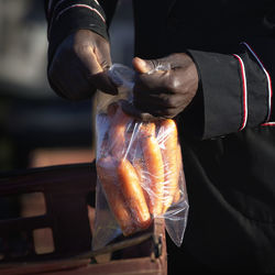 Midsection of man preparing food