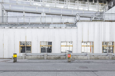 Construction site by building in city