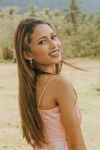 Portrait of a smiling young woman