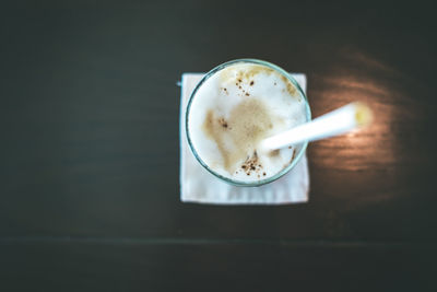 Directly above shot of coffee cup on table