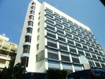 Low angle view of skyscrapers against sky