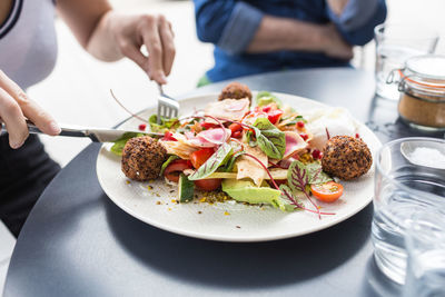 Close-up of serving food in plate