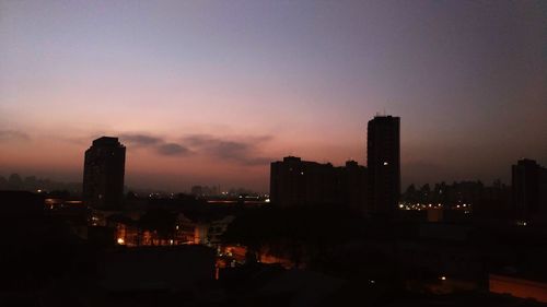City lit up at sunset