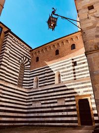 Low angle view of building against blue sky