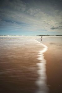 Scenic view of calm sea against sky
