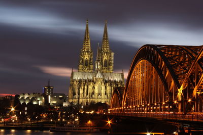 Low angle view of cologne city at night