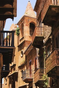 Low angle view of old building against sky