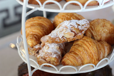 Close-up of croissants on rack