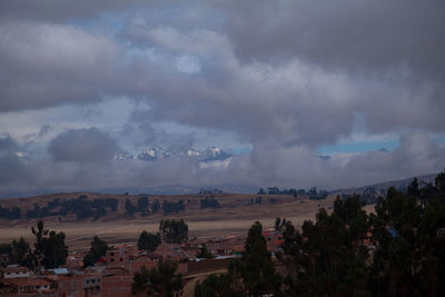 Panoramic view of landscape and buildings against sky