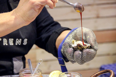 Close-up of man holding ice cream