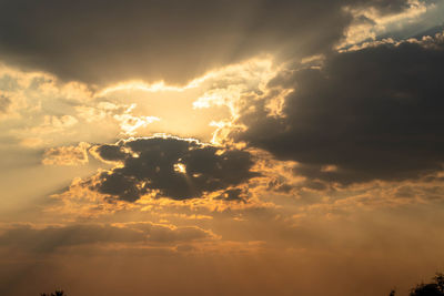 Low angle view of dramatic sky during sunset