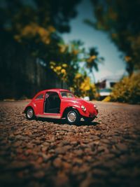 Close-up of toy car on road