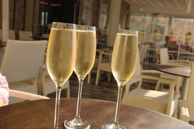 Close-up of wine in glass on table at restaurant