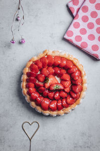 High angle view of strawberry on cake