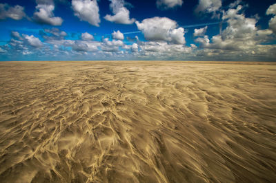 Scenic view of desert against sky