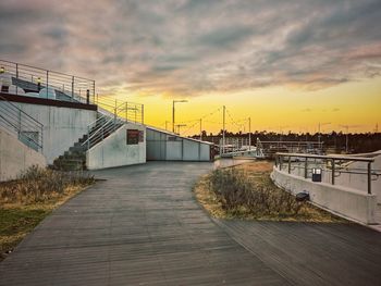 View of building bridge against sky during sunset