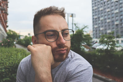 Portrait of young man wearing eyeglasses