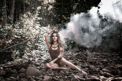 Portrait of woman in forest