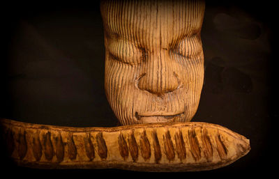 High angle view of bread on table against black background