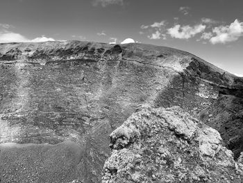 Scenic view of rock formations against sky
