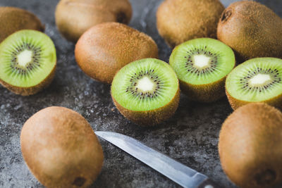 Fresh kiwis on table