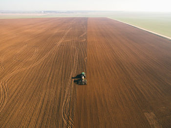 High angle view of agricultural field against sky