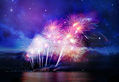 Firework display at night