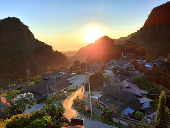 High angle view of townscape against sky during sunset