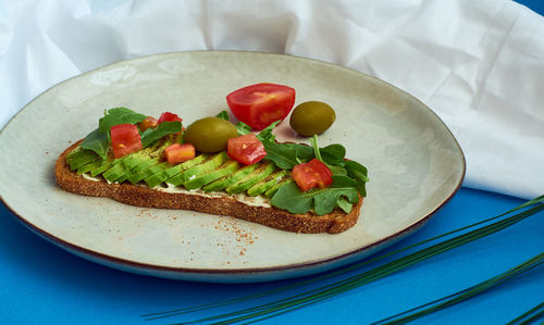 High angle view of fruits in plate on table