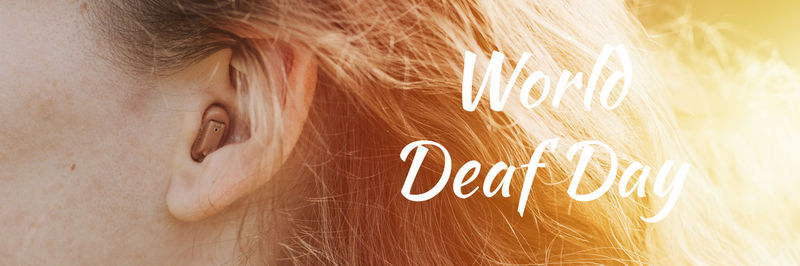 Close-up of woman with text