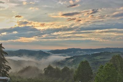 Scenic view of landscape against sky during sunset