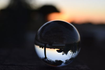 Close-up of crystal ball on water